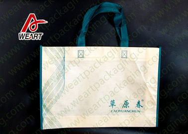 中国 扱われる非編まれる長い綿/リボンは衣類によって浮彫りにされるロゴのための袋を運びます 工場