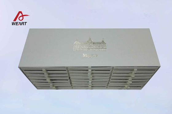 小さい円形のリボンのハンドルが付いている特別な多引出しのペーパー宝石箱